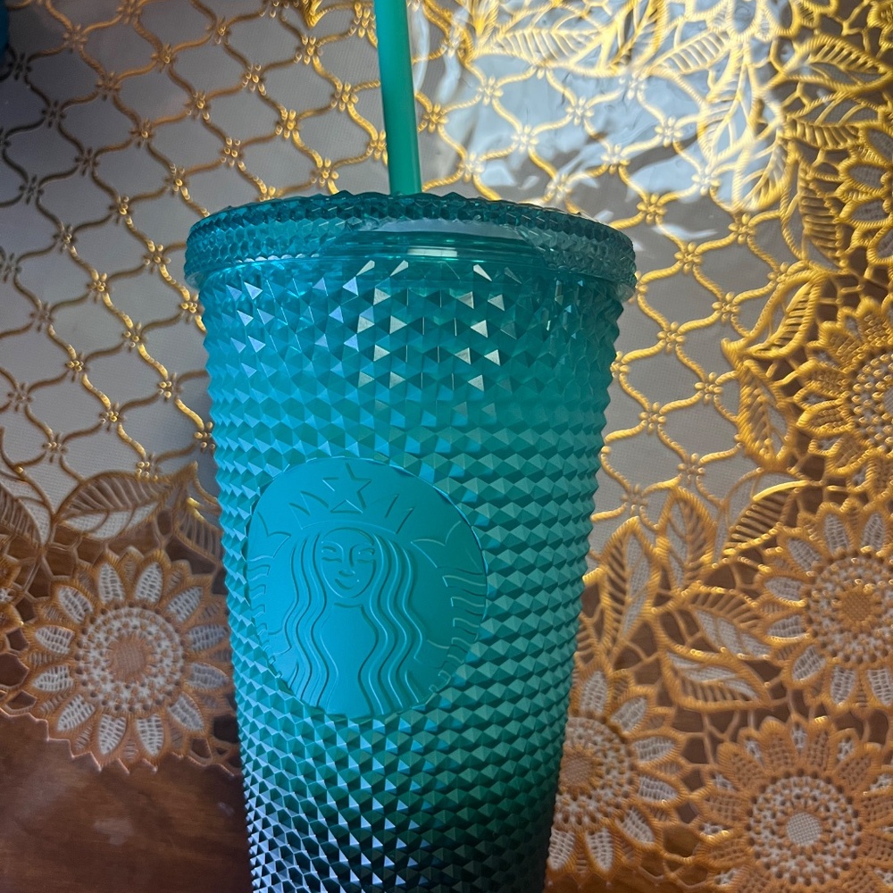 Tall studded Starbucks cup